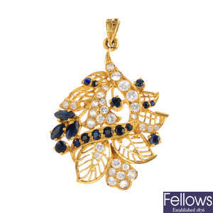 A sapphire and cubic zirconia pendant.