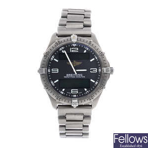 BREITLING - a gentleman's titanium Professional Aerospace chronograph bracelet watch.