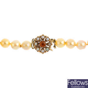 A cultured pearl single-strand necklace, with 9ct gold citrine clasp.