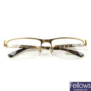 CHOPARD - a pair of semi-rimless glasses.