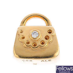 PANDORA - a 14ct gold diamond handbag charm.