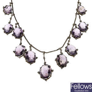 An amethyst and split pearl necklace.