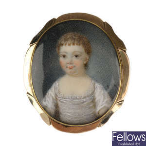 A mid Victorian portrait gold brooch.