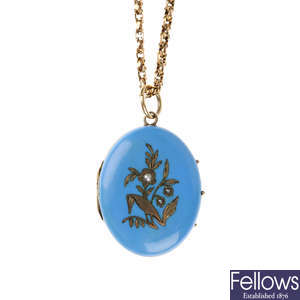 A late Victorian enamel and split pearl locket with 9ct gold chain.