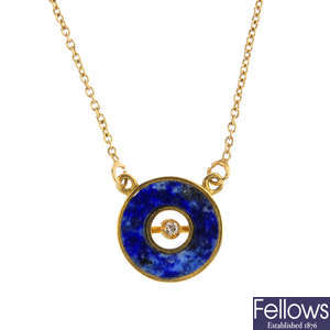 A diamond and lapis lazuli pendant.