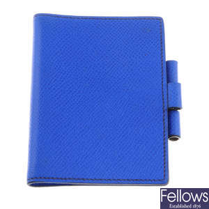 HERMÈS - a small leather electric blue Vision agenda cover.
