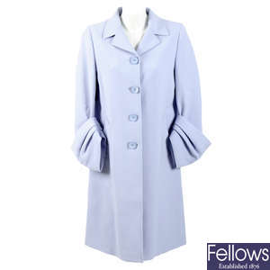 PRADA - a knee-length pastel blue wool coat.