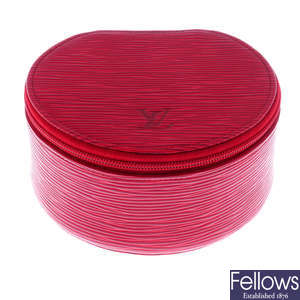 LOUIS VUITTON - a small red epi leather jewellery case.