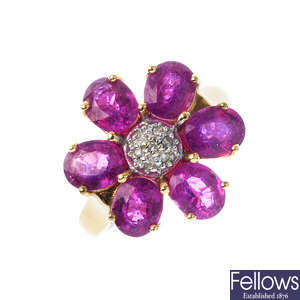 An 18ct gold glass-filled ruby and diamond cluster ring.
