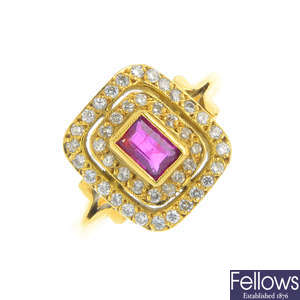 A gold ruby and diamond cluster ring.