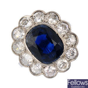 A mid 20th century platinum sapphire and diamond cluster ring.