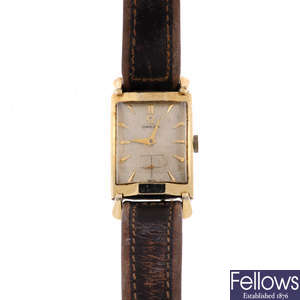 OMEGA - a gentleman's rolled gold wrist watch.