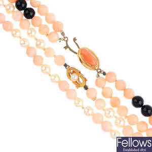 Two cultured pearl and coral necklaces. 