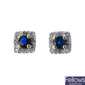 A pair of sapphire and diamond stud earrings.