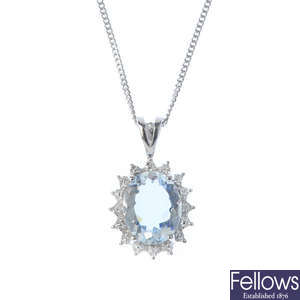 A 9ct gold aquamarine and diamond cluster pendant, with 9ct gold chain.