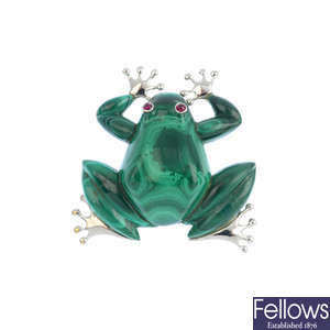 A malachite frog brooch.
