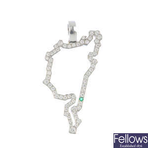 A diamond and emerald Nurburgring racetrack pendant.