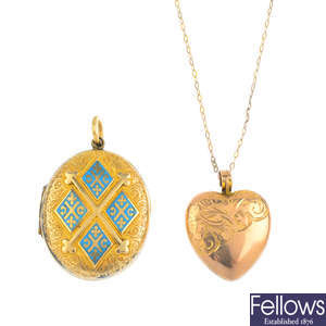 Two early 20th century lockets, and a chain.