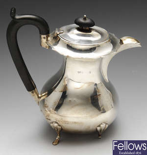 A 1920's silver hot water pot (a/f).