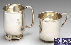 Two early twentieth century silver mugs.