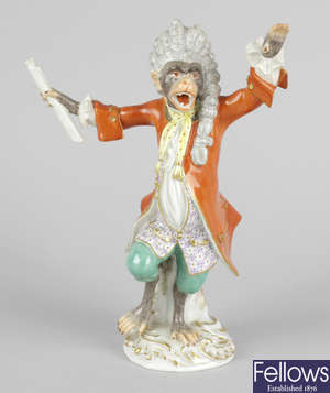 A 20th century Meissen monkey band conductor.