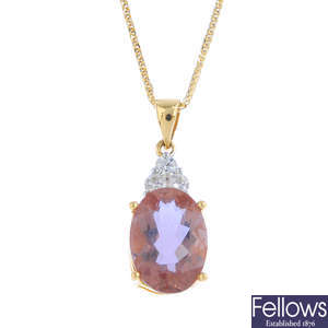 A colour change gem-set and diamond pendant, with chain.