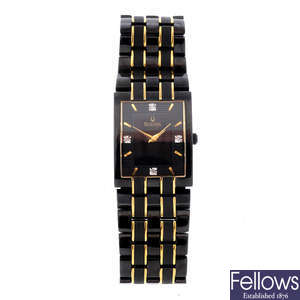 BULOVA - a gentleman's PVD-treated stainless steel bracelet watch.
