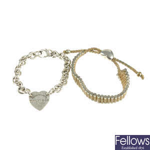 Four items of designer jewellery.