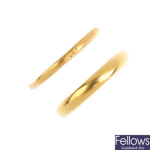 Two 22ct gold band rings.