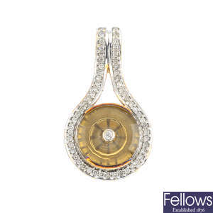 A 9ct gold diamond and smoky quartz pendant.