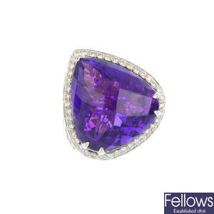 An 18ct gold amethyst, sapphire and diamond dress ring.