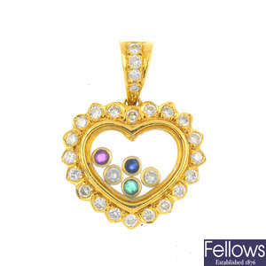 A diamond and gem-set heart pendant.