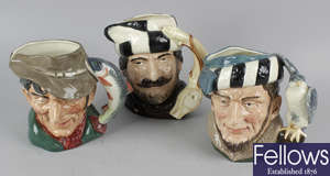 A group of eleven Royal Doulton character jugs