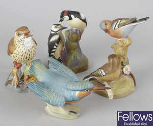 A group of Royal Worcester and other bird figurines
