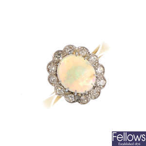 A mid 20th century gold and platinum opal and diamond ring.
