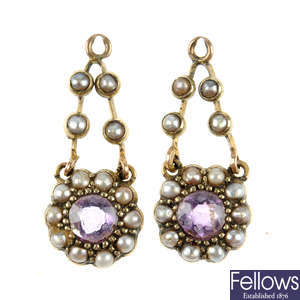 A pair of early 20th century gold amethyst and split pearl ear pendant panels.