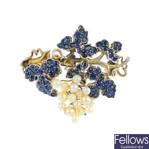 A sapphire and seed pearl grape brooch.