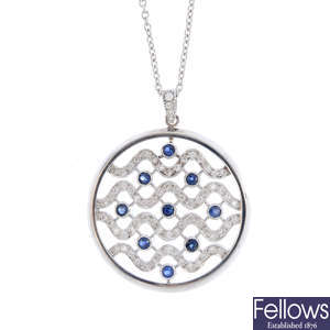 A diamond and sapphire pendant, with chain. 