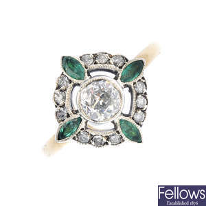 A diamond and emerald ring.