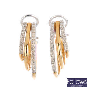 A pair of 9ct gold diamond hoop earrings.