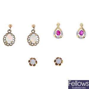 Seven pairs of diamond and gem-set earrings.