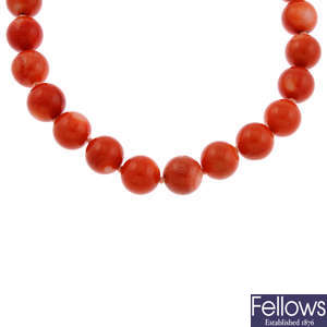 A dyed coral bead necklace.