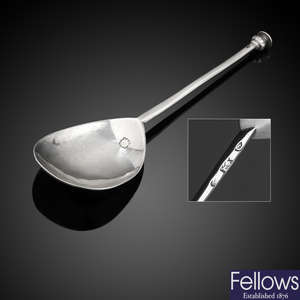 An Elizabeth I silver seal-top spoon by William Cawdell.