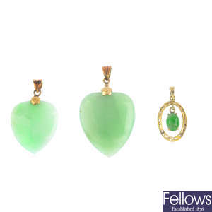 Three jade pendants.
