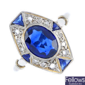 An Art Deco platinum and gold synthetic sapphire and diamond dress ring.