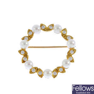 An 18ct gold cultured pearl and diamond brooch.