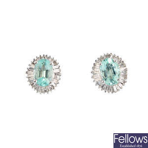 A pair of green beryl and diamond cluster earrings.