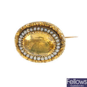 A late Victorian foil-backed citrine and split pearl brooch.