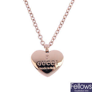 GUCCI - a heart pendant, with chain.