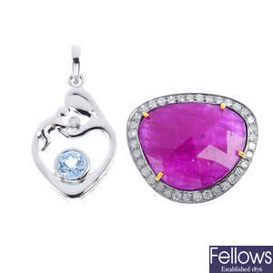 Two diamond gem-set pendants.